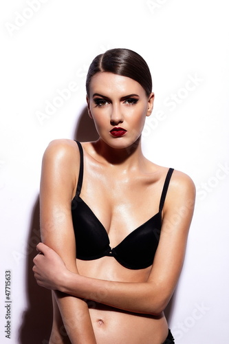 Photo: glamor sexy model with red lips,bright makeup in black lingerie glamor sexy model with red lips,bright makeup in black lingerie