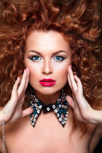 Photo: glamor sexy redhead model with red lips,bright makeup glamor sexy redhead model with red lips,bright makeup