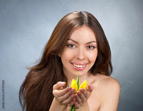 Photo: young women with flowers young women with flowers