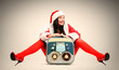 Foto: Sexy Santa girl with old tape recorder Sexy Santa girl with old tape recorder