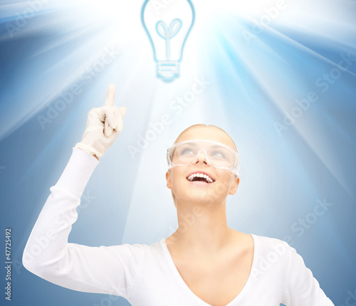 Photo: woman in protective glasses and gloves woman in protective glasses and gloves