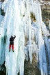 Ice climbing the waterfall.