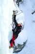 Ice climbing the waterfall.