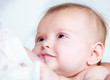 Mother breast feeding newborn baby