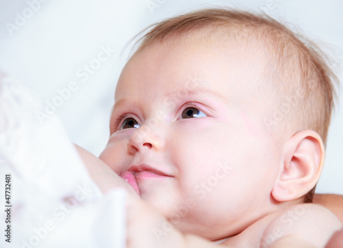 Photo: Mother breast feeding newborn baby Mother breast feeding newborn baby