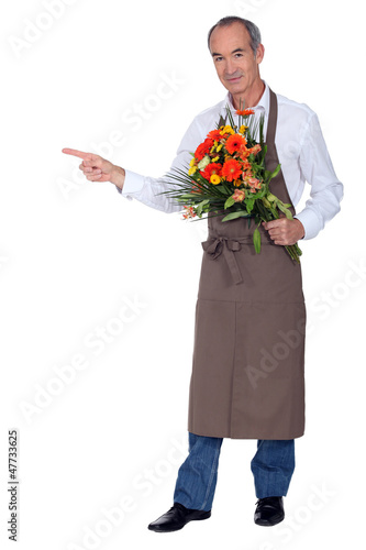 Photo: Florist indicating the place Florist indicating the place