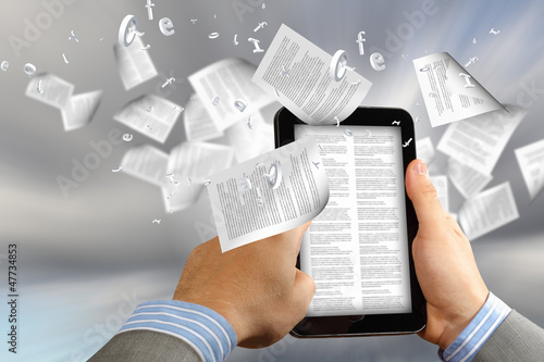 Photo: e book reader and books e book reader and books