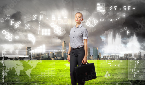 Photo: Businesswoman agaisnt virtual background Businesswoman agaisnt virtual background