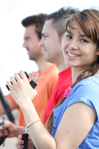 Photo: Young people in fitness workout outdoors Young people in fitness workout outdoors