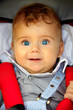 Baby boy portrait in stroller