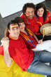 Four Spanish soccer fans waiting for the  match to start