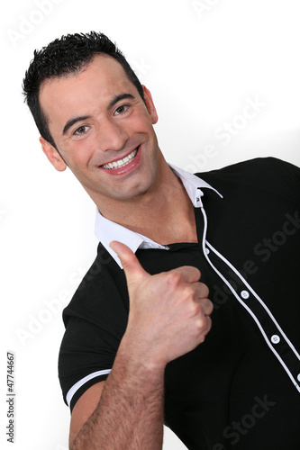 Photo: Man giving the thumb's up Man giving the thumb's up