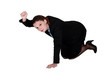 Businesswoman kneeling on the floor and holding up her fist