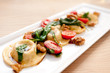 decadent stuffed ravioli with fresh tomatoes and sage