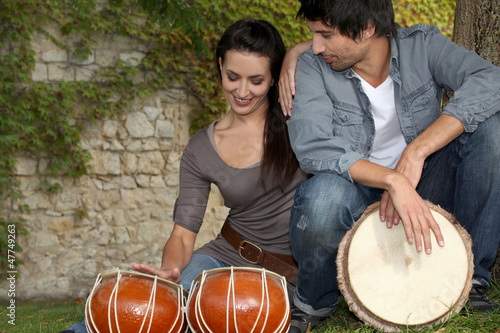 Photo: Couple with drums Couple with drums