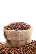 Foto: canvas sack with coffee beans on white canvas sack with coffee beans on white