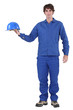 craftsman holding his helmet
