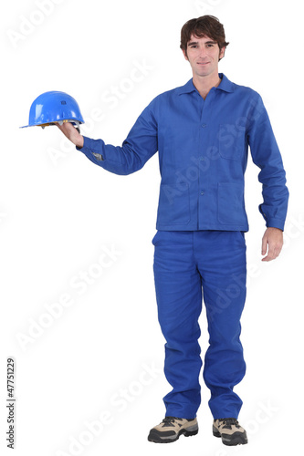 Photo: craftsman holding his helmet craftsman holding his helmet