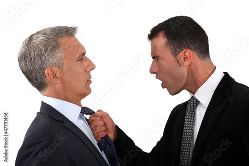 Photo: businessmen fighting businessmen fighting