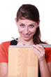 Young woman measuring plank