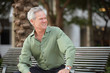Photo: Businessman sitting on a bench Businessman sitting on a bench