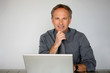 Foto: Businessman using a laptop computer Businessman using a laptop computer