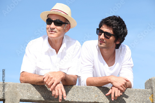 Photo: Elderly man and grandson Elderly man and grandson