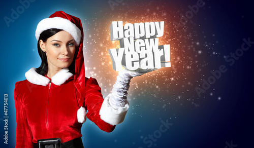 Photo: Portrait of girl wearing santa claus clothes Portrait of girl wearing santa claus clothes