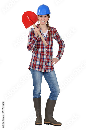 Photo: Tradeswoman holding a spade Tradeswoman holding a spade
