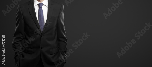 Photo: man in black suit man in black suit