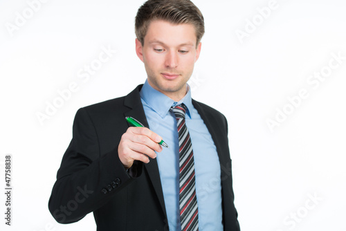 Photo: geschäftsmann macht sich notizen geschäftsmann macht sich notizen