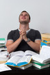 Young Student overwhelmed with studying and praying