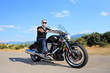 A young biker riding a customized motorcycle