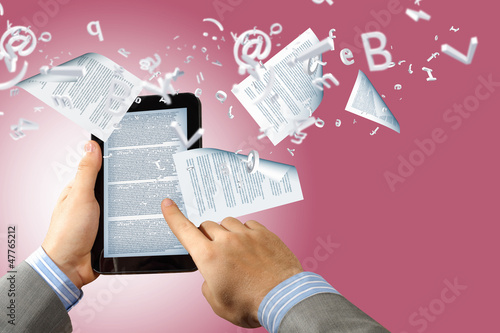Photo: e book reader and books e book reader and books