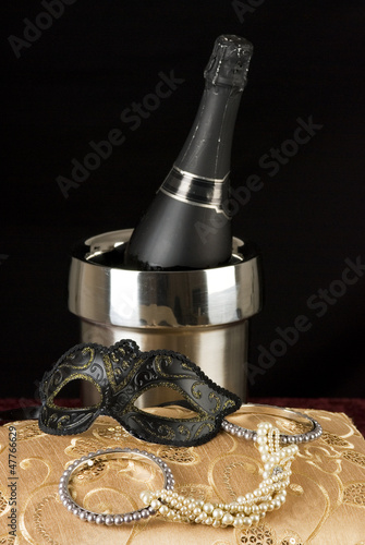 Photo: champagne and mask champagne and mask