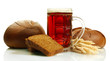 tankard of kvass and rye breads with ears, isolated on white
