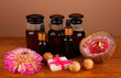 ingredients for soap making on brown background