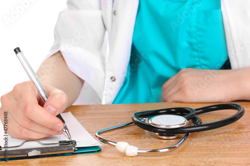 Photo: Doctor appoint prescription drugs to patients isolated on white Doctor appoint prescription drugs to patients isolated on white