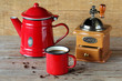 Photo: Cup of cofee with rustic coffee pot Cup of cofee with rustic coffee pot