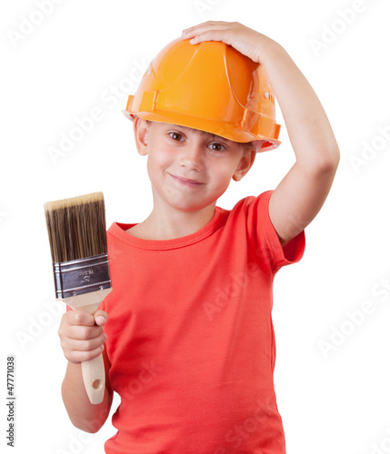 Photo: Girl holds the paintbrush Girl holds the paintbrush