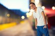 Stylish young man over blurred background