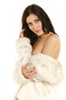 Photo: young woman in a fur coat young woman in a fur coat