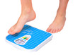 Man's legs ,which weighed on floor scale. Isolated