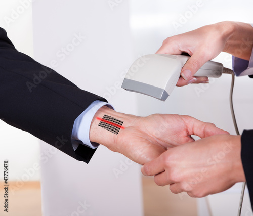 Photo: Scanning barcode on the hand Scanning barcode on the hand