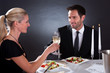 Romantic couple toasting each other