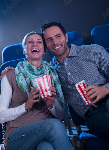 Photo: Stylish couple enjoying a movie Stylish couple enjoying a movie