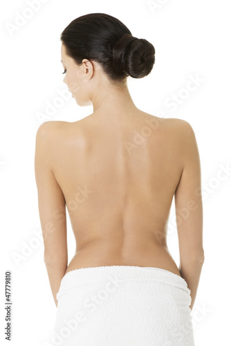 Photo: Young beautiful nude woman with towel Young beautiful nude woman with towel