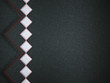 Leather background with red stitch and white rhombuses