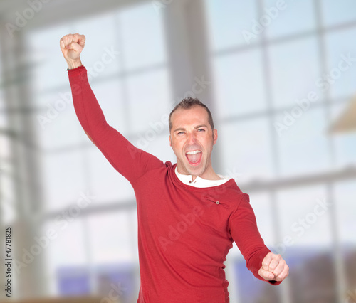 Photo: Winner man celebrating something Winner man celebrating something