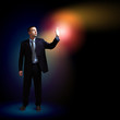 Businessman with light shining